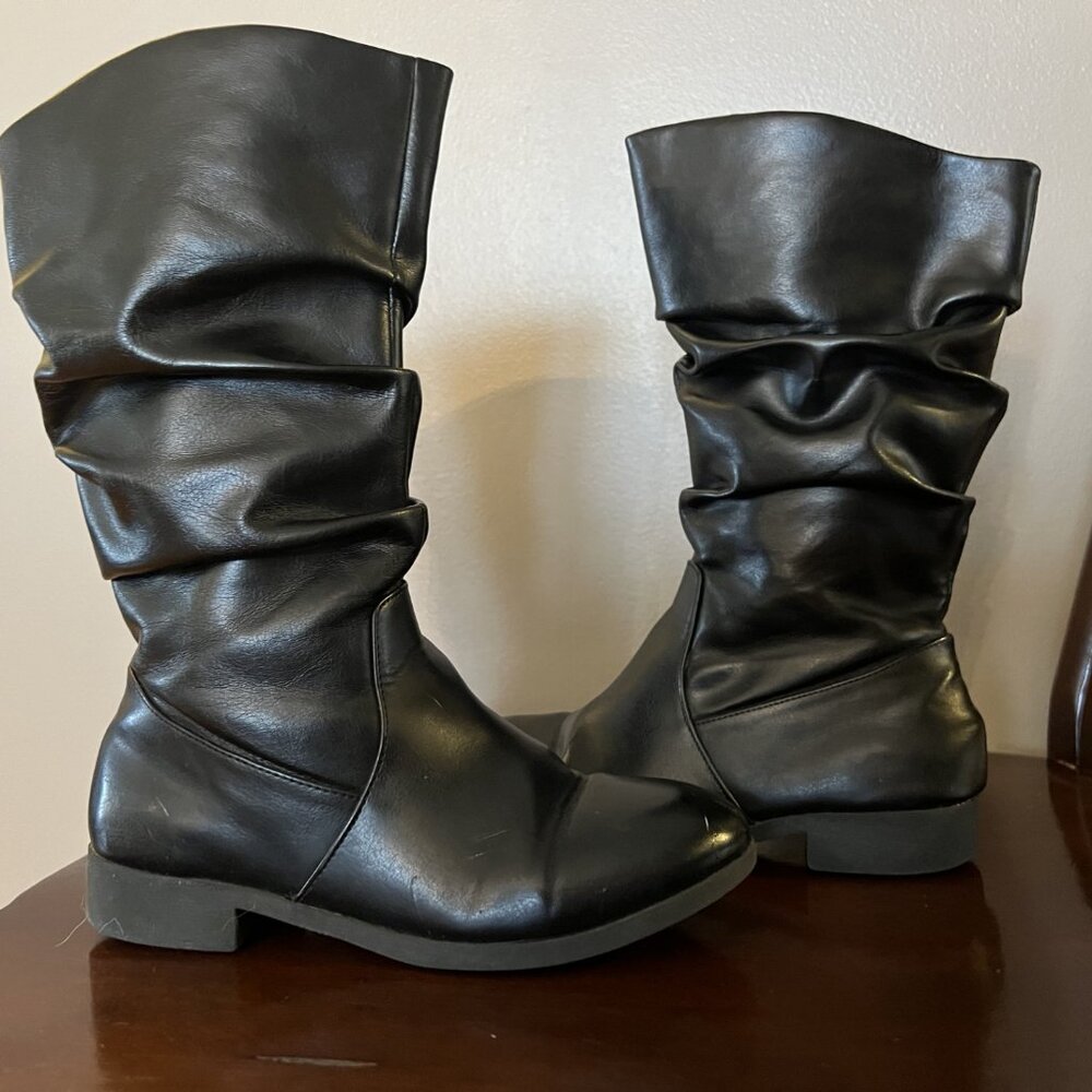 Black vinyl boots